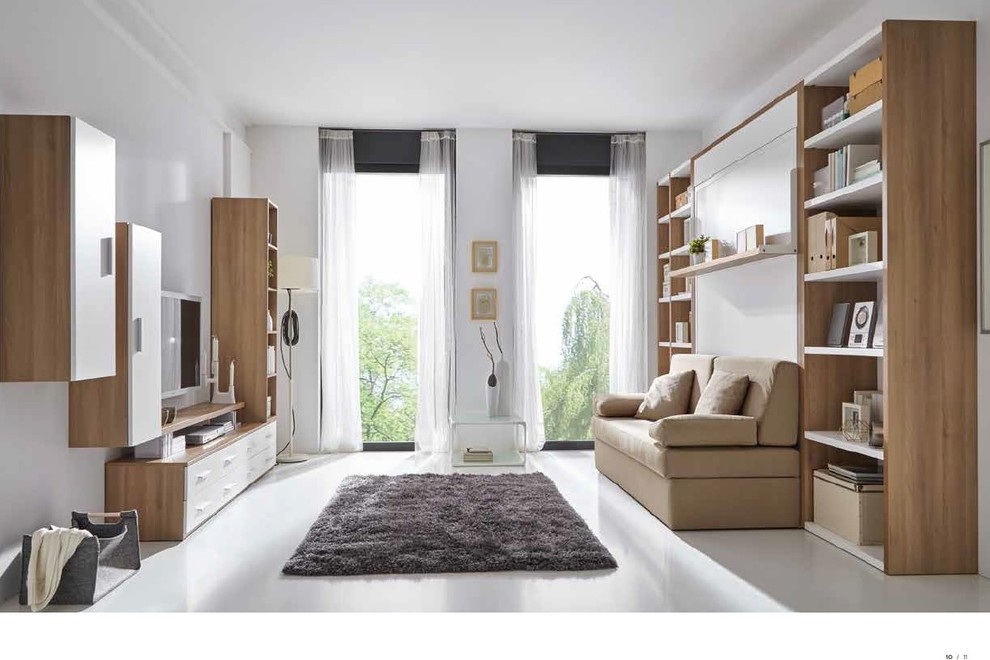 Foto di un soggiorno moderno di medie dimensioni e stile loft con sala della musica, pareti bianche e TV a parete