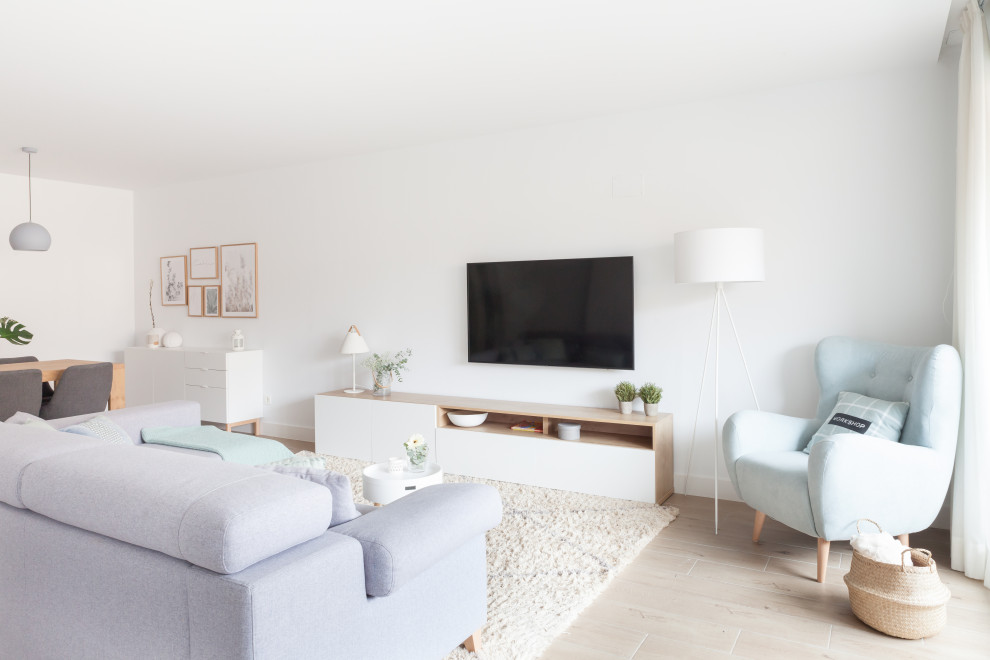 Photo of a large scandi open plan living room in Other with white walls, ceramic flooring, a wall mounted tv and beige floors.