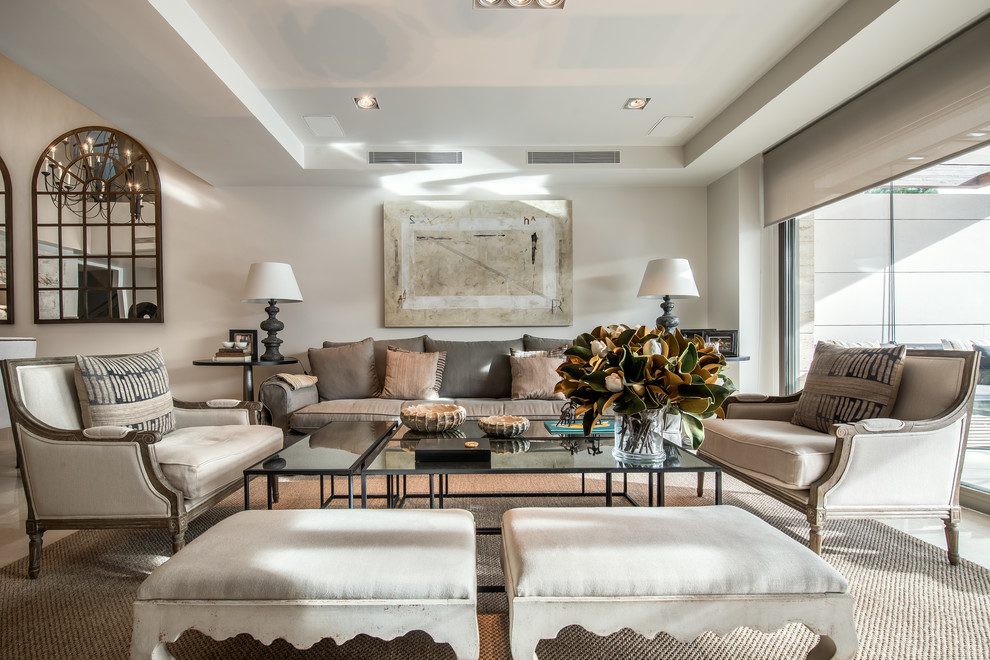 Example of a large transitional formal and open concept living room design in Madrid with white walls and no fireplace