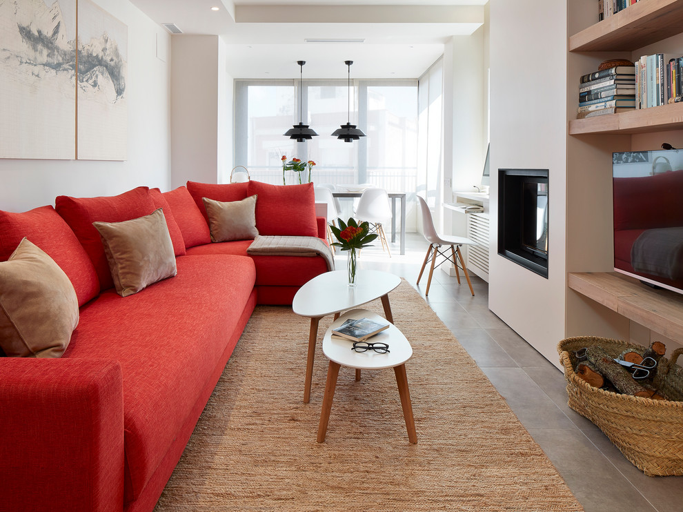 Immagine di un soggiorno minimal di medie dimensioni e aperto con sala formale, pareti bianche, pavimento con piastrelle in ceramica, stufa a legna e parete attrezzata