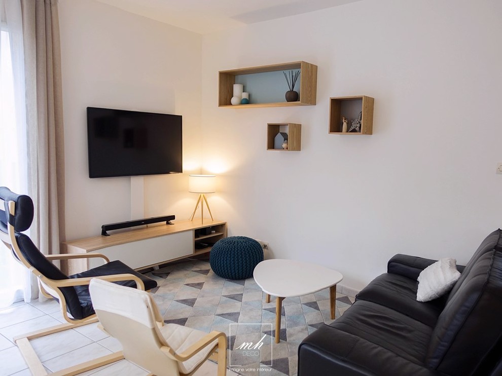 Example of a small danish open concept and formal living room design in Paris with white walls, a wall-mounted tv and no fireplace