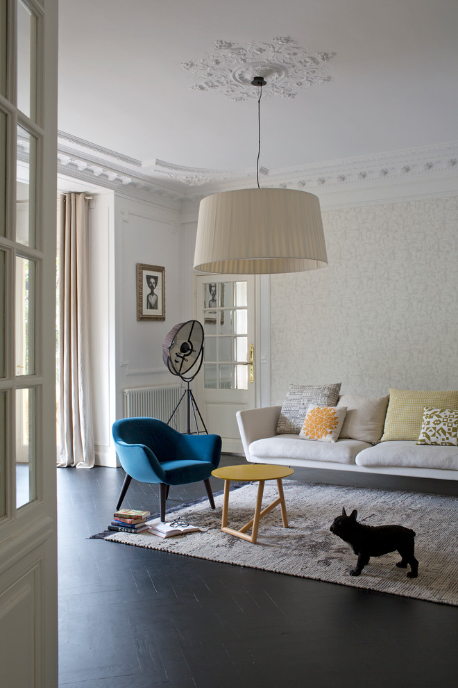 Living room - scandinavian dark wood floor living room idea in Nice with beige walls