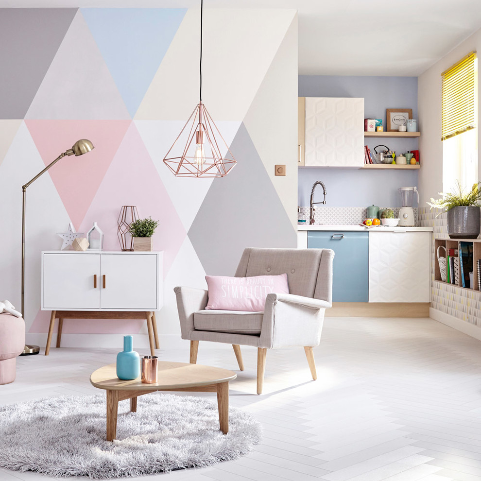 На фото: большая открытая гостиная комната в скандинавском стиле с разноцветными стенами без камина, телевизора с