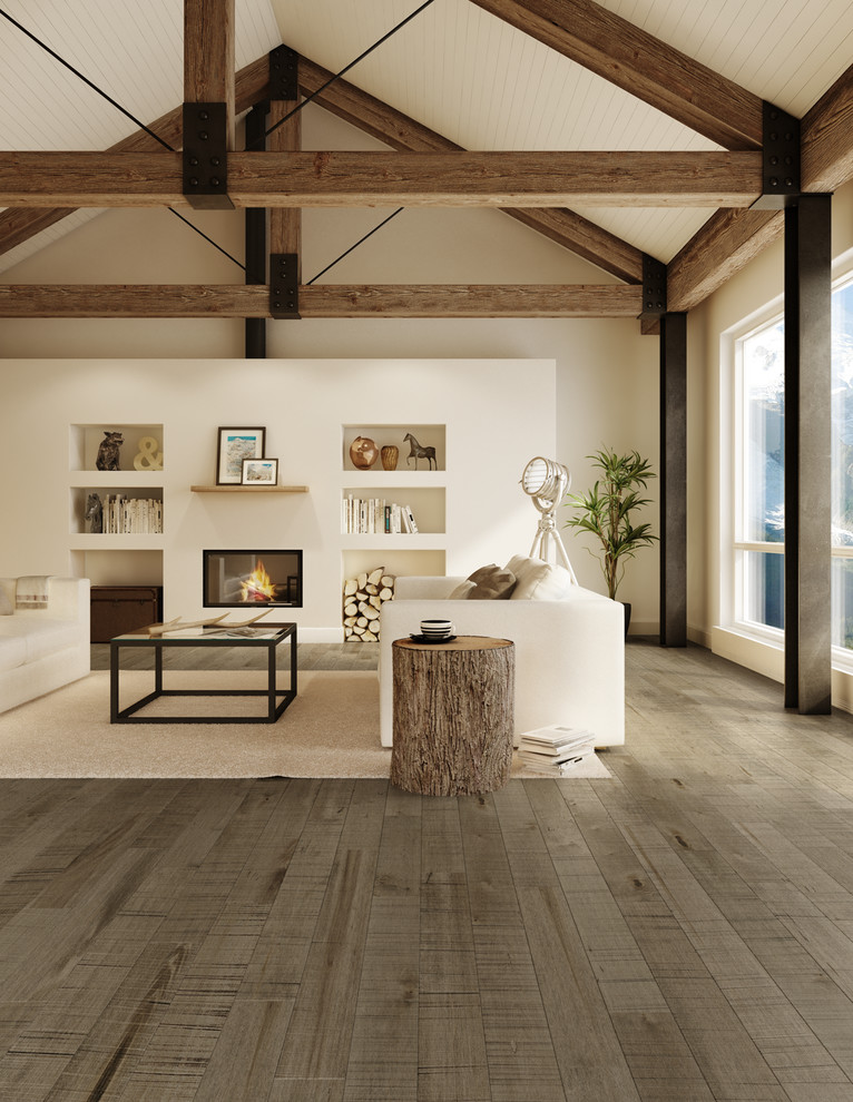 Idées déco pour un grand salon mansardé ou avec mezzanine éclectique avec une bibliothèque ou un coin lecture, un mur beige et un sol en bois brun.