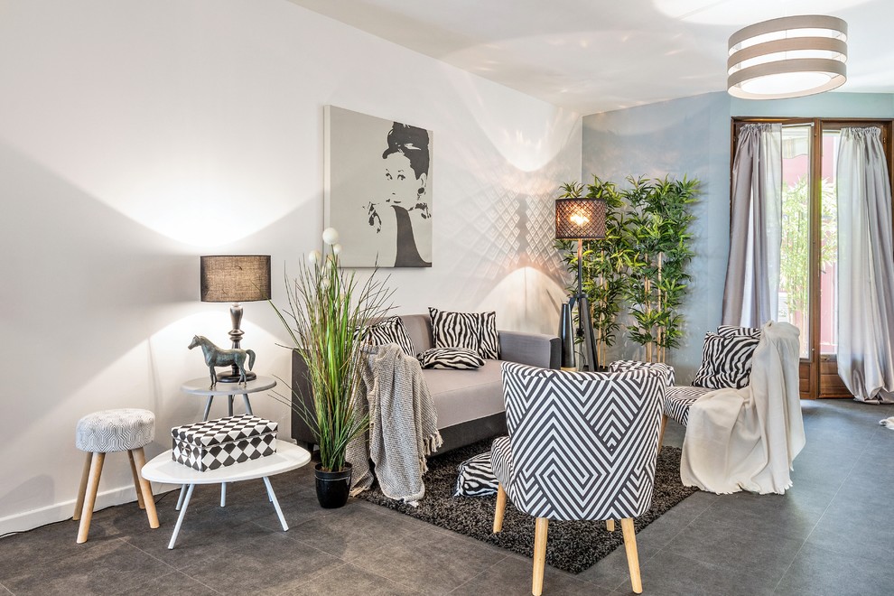 Example of a mid-sized danish open concept vinyl floor and gray floor living room design in Grenoble with white walls and no fireplace