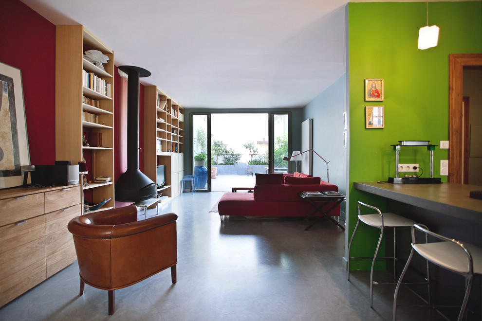 Photo of an eclectic open plan living room in Montpellier with multi-coloured walls, a built-in media unit and a hanging fireplace.