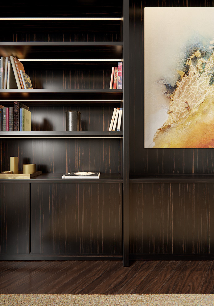 На фото: большая открытая гостиная комната в современном стиле с с книжными шкафами и полками, бежевыми стенами, темным паркетным полом и коричневым полом без камина, телевизора с