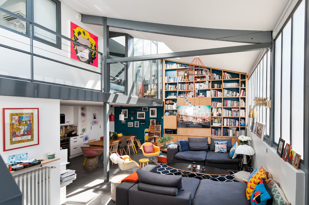 This is an example of a medium sized eclectic enclosed living room in Paris with white walls, ceramic flooring and grey floors.