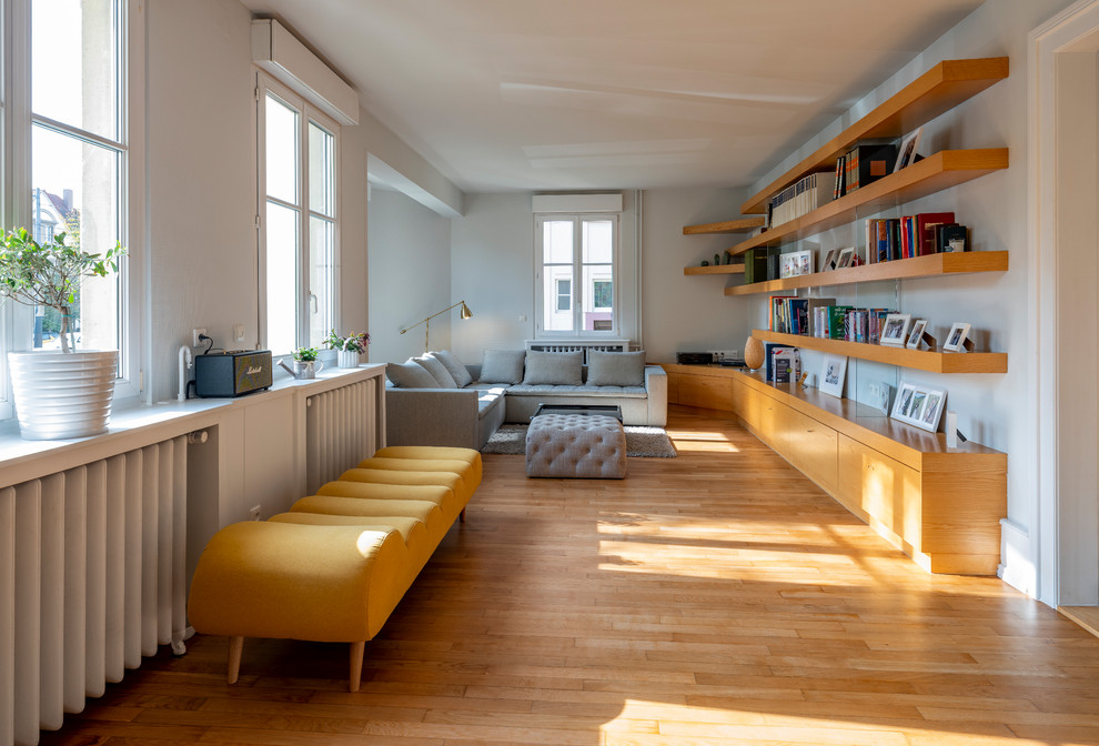 Photo of a scandi living room in Strasbourg with feature lighting.