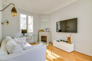 Salon Haussmannien Avec Un Manteau De Cheminee En Pierre Photos Et Idees Deco De Salons Septembre 2021 Houzz Fr