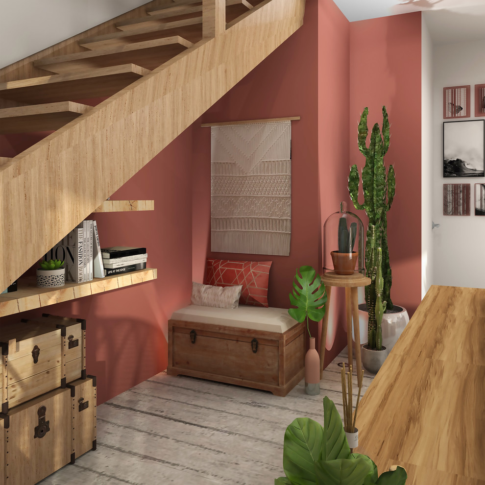 Пример оригинального дизайна: маленькая открытая гостиная комната в морском стиле с с книжными шкафами и полками, красными стенами, бетонным полом и серым полом без камина, телевизора для на участке и в саду