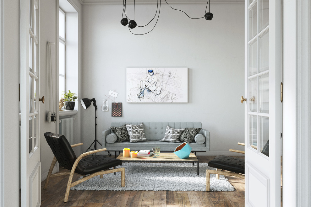 Photo of a large scandi formal enclosed living room in Strasbourg with white walls, light hardwood flooring, no fireplace, no tv and feature lighting.