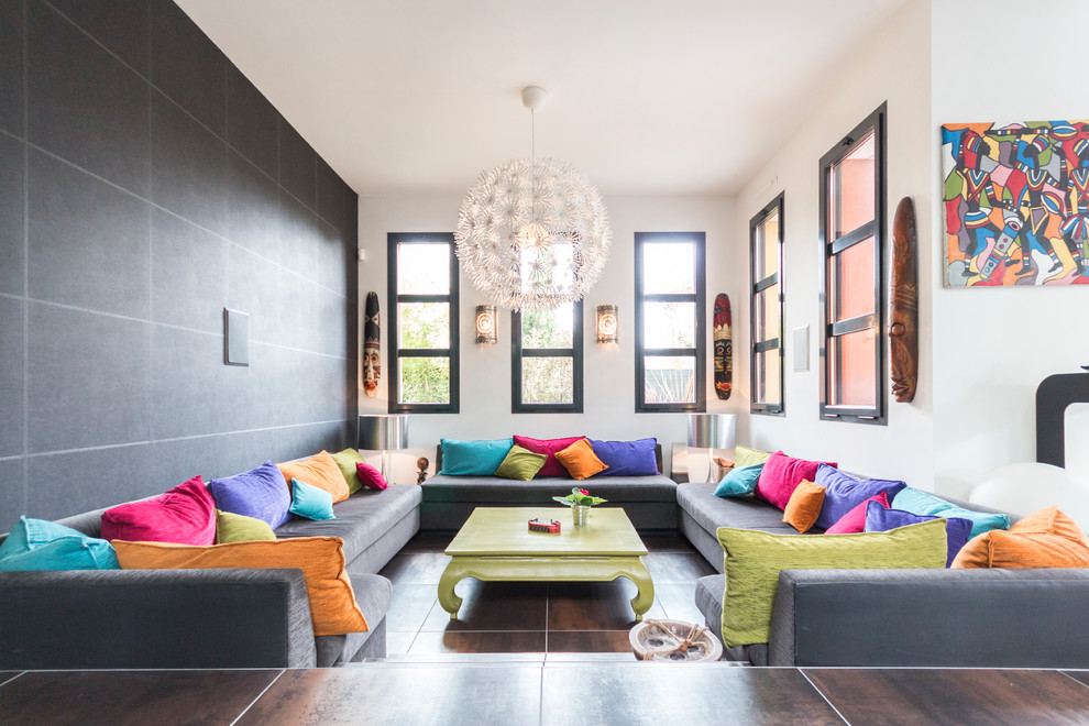Inspiration for a large world-inspired formal open plan living room in Nantes with multi-coloured walls.