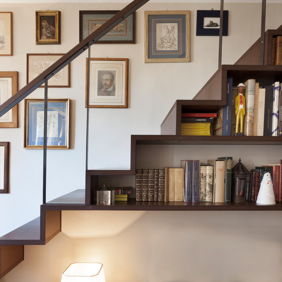 Design ideas for a traditional staircase in Turin with under stair storage.