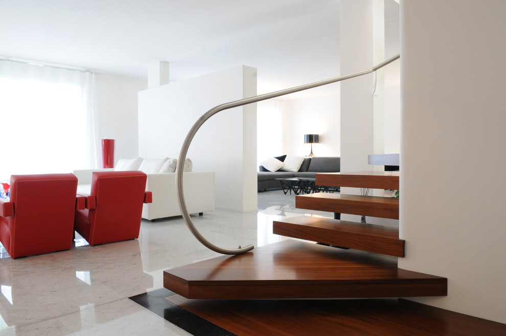Idée de décoration pour un escalier minimaliste en L avec des marches en bois et éclairage.