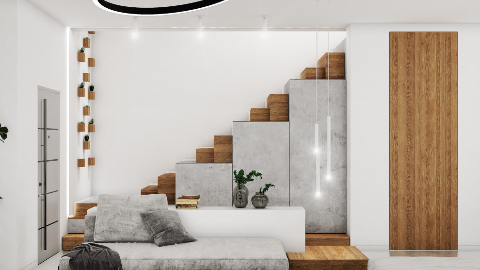 Idées déco pour un très grand escalier moderne en L avec des marches en bois et des contremarches en béton.