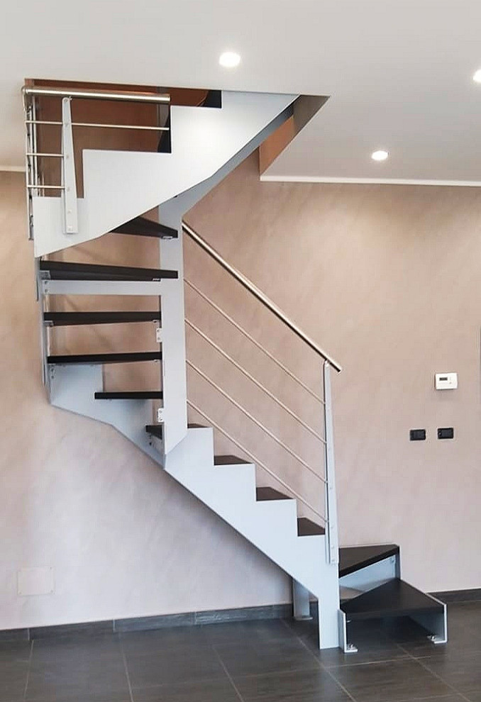 Inspiration for a small modern wood u-shaped mixed railing staircase in Catania-Palermo with open risers.