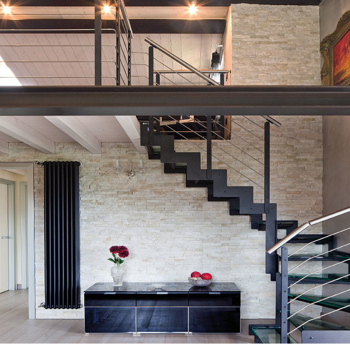 Design ideas for a medium sized rural glass curved metal railing staircase in Other with open risers.
