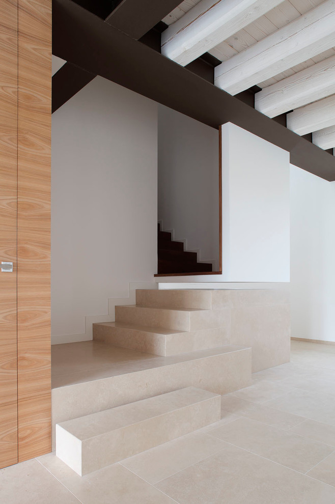 This is an example of a contemporary l-shaped staircase in Venice.