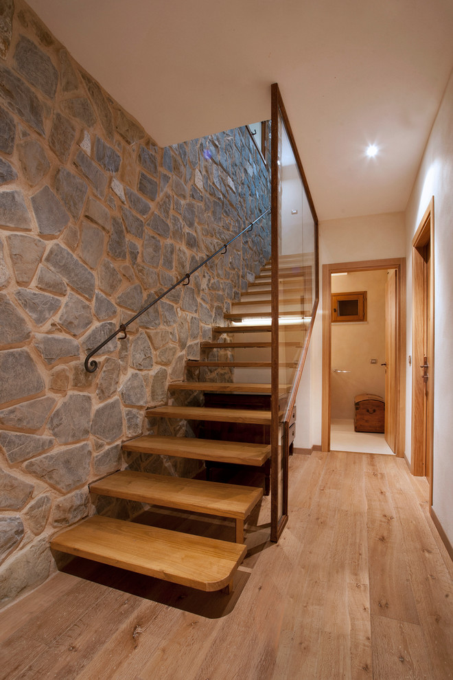 Contemporary wood straight staircase in Florence with open risers.