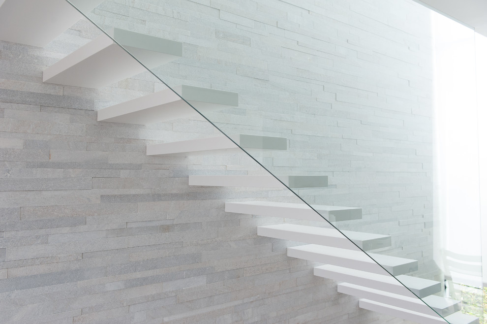 Photo of a contemporary staircase in Venice with feature lighting.