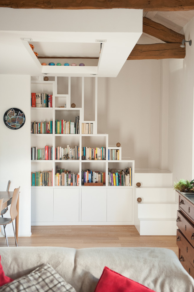 Inspiration for a medium sized scandi l-shaped staircase in Venice with under stair storage.