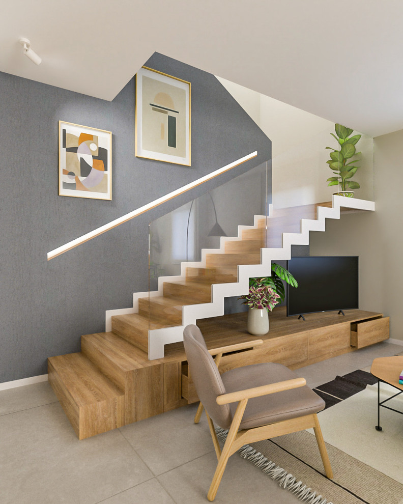 Diseño de escalera en U actual de tamaño medio con escalones de madera, contrahuellas de madera y barandilla de vidrio