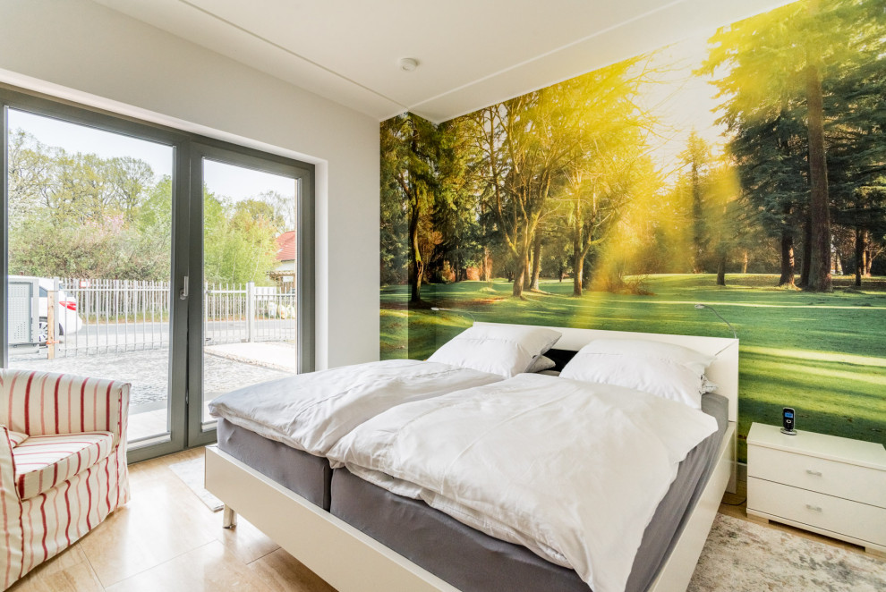 Bedroom - mid-sized contemporary guest limestone floor and beige floor bedroom idea in Berlin