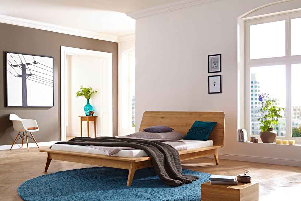 This is an example of a large contemporary bedroom in Cologne.