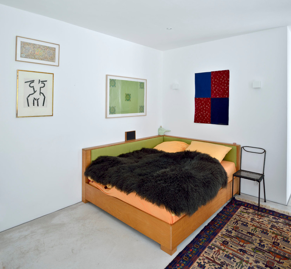Foto di una camera da letto contemporanea con nessun camino