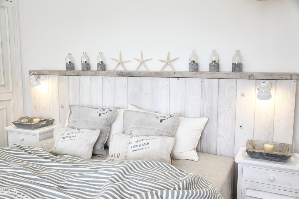 Example of a beach style bedroom design in Hamburg with no fireplace