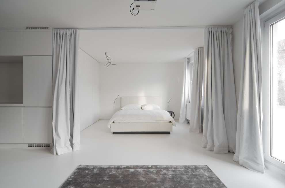 Inspiration for a mid-sized contemporary bedroom remodel in Berlin with white walls and no fireplace