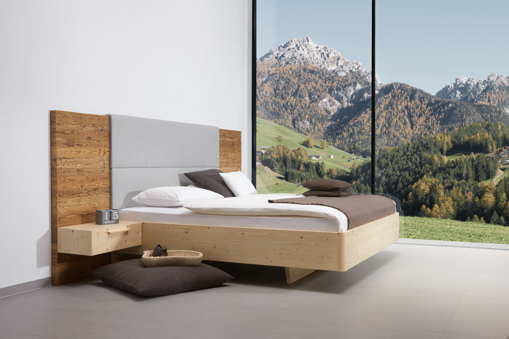 Bedroom - mid-sized contemporary master carpeted and gray floor bedroom idea in Nuremberg with white walls and no fireplace