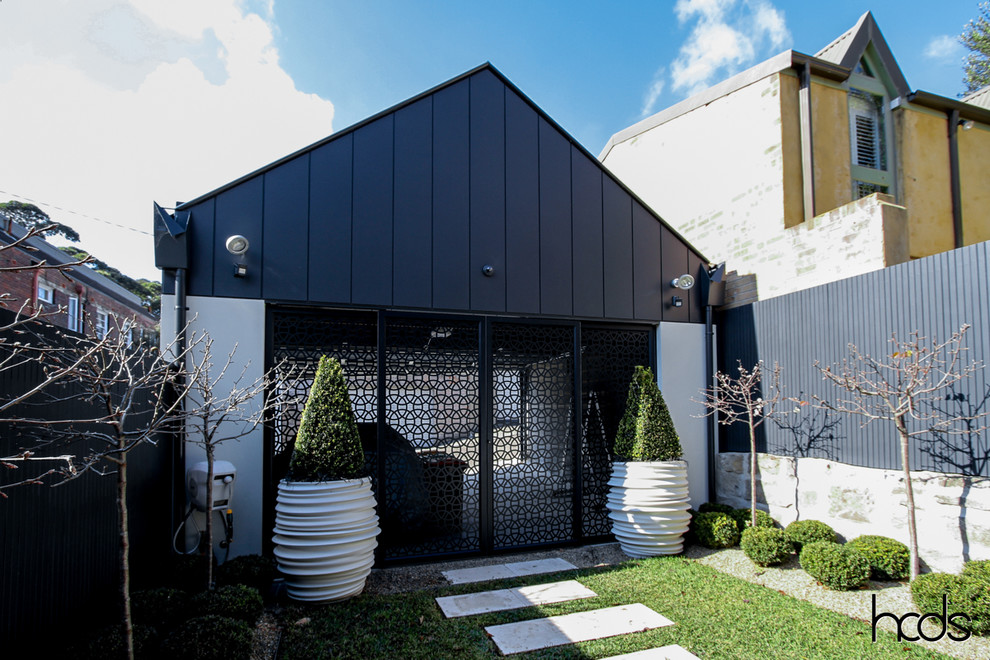 Photo of a contemporary garden shed and building in Sydney.