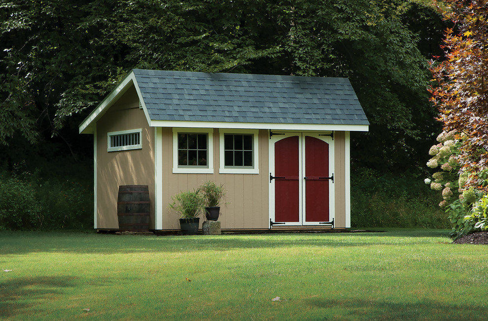 Inspiration for a large cottage detached garden shed remodel in Cleveland