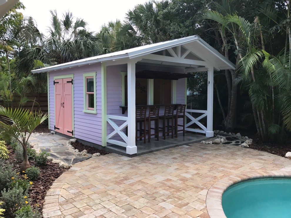 Small world-inspired detached garden shed and building in Tampa.