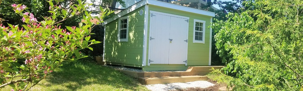 This is an example of a medium sized modern detached garden shed in Boston.