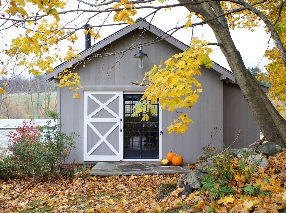 Photo of a medium sized country garden shed and building in New York.