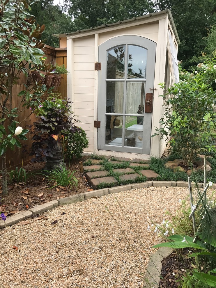 Medium sized rural detached garden shed in New Orleans.