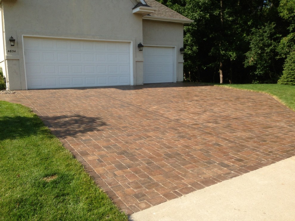 Belgard paver driveway Traditional Shed Minneapolis by Backyard Paradise Landscaping LLC
