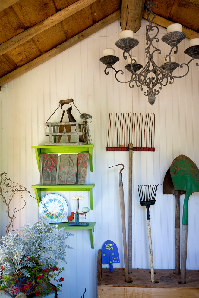 Example of a small eclectic detached garden shed design in Denver