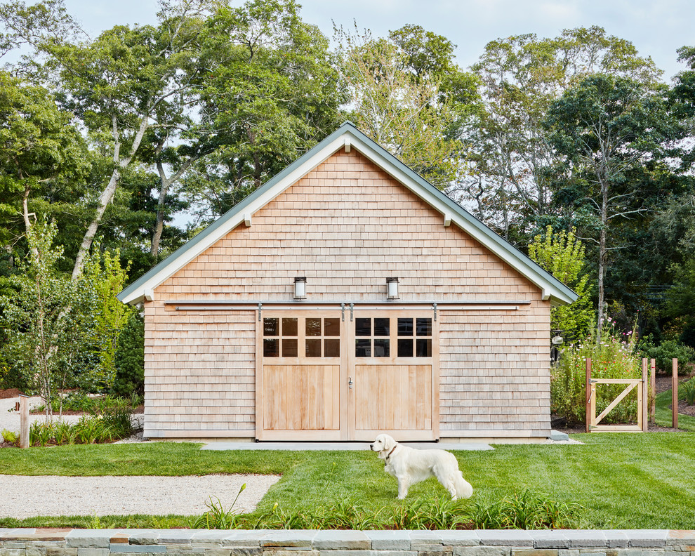 Photo of a beach style detached garden shed and building in Boston.