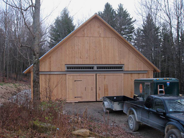 This is an example of a modern garden shed and building in Burlington.