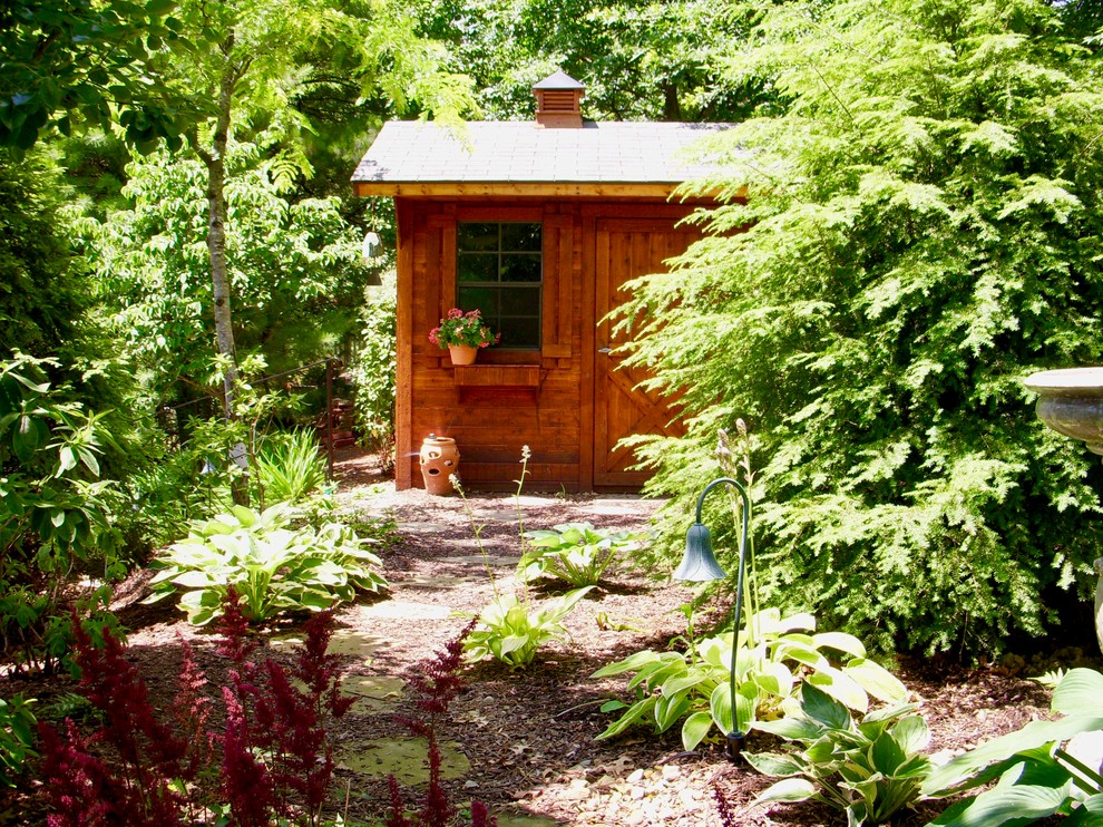 Garden shed - mid-sized rustic detached garden shed idea in Other
