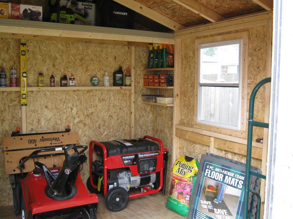 Immagine di piccoli garage e rimesse indipendenti moderni con ufficio, studio o laboratorio
