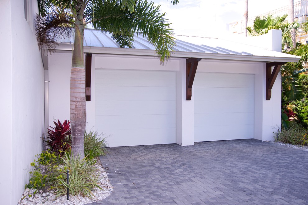 Inspiration for a tropical garage remodel in Tampa