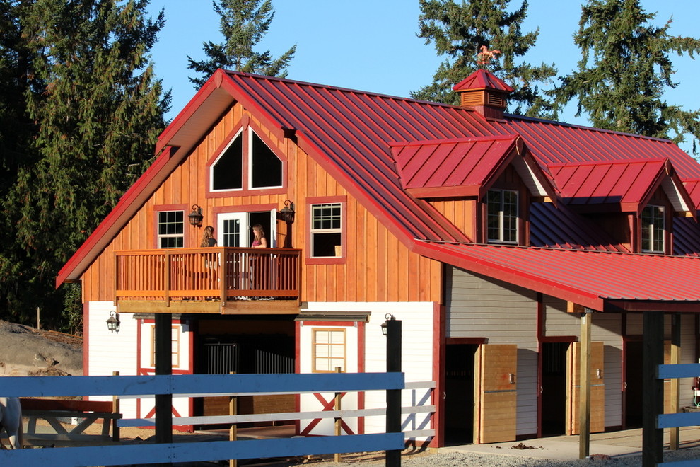 Example of a huge farmhouse detached barn design in Vancouver