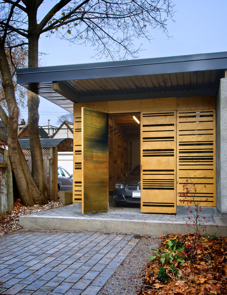 Exempel på en modern garage och förråd