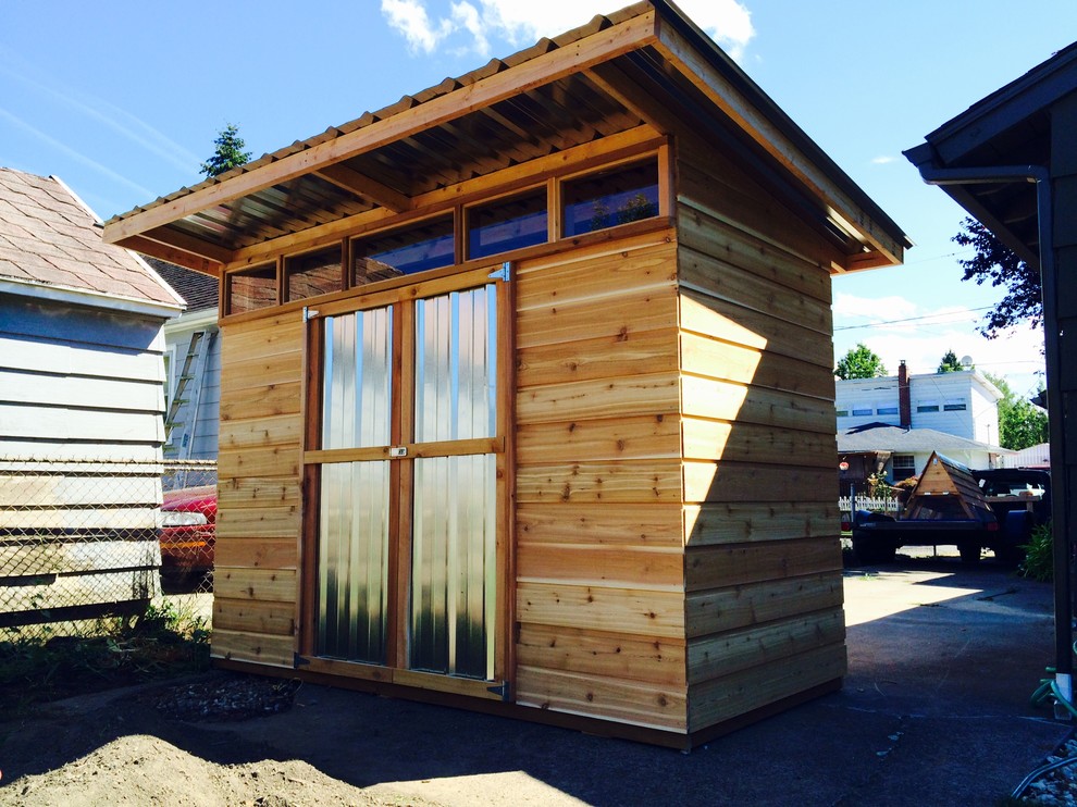 Design ideas for a medium sized modern detached garden shed in Portland.
