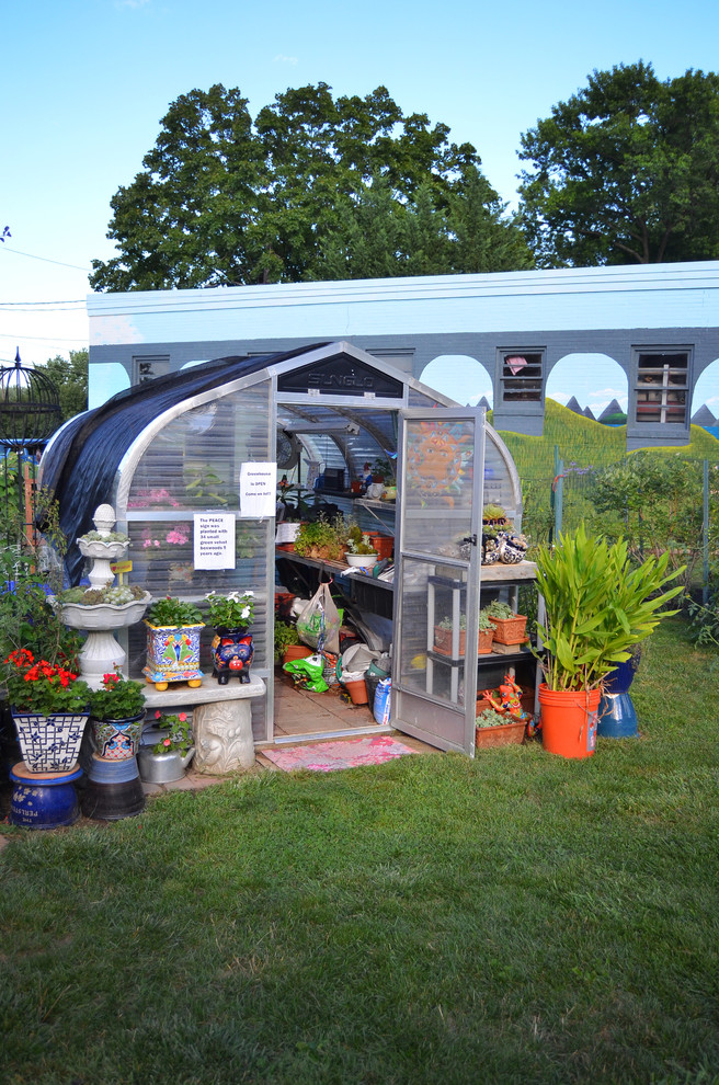 This is an example of an eclectic detached garden shed in Philadelphia.